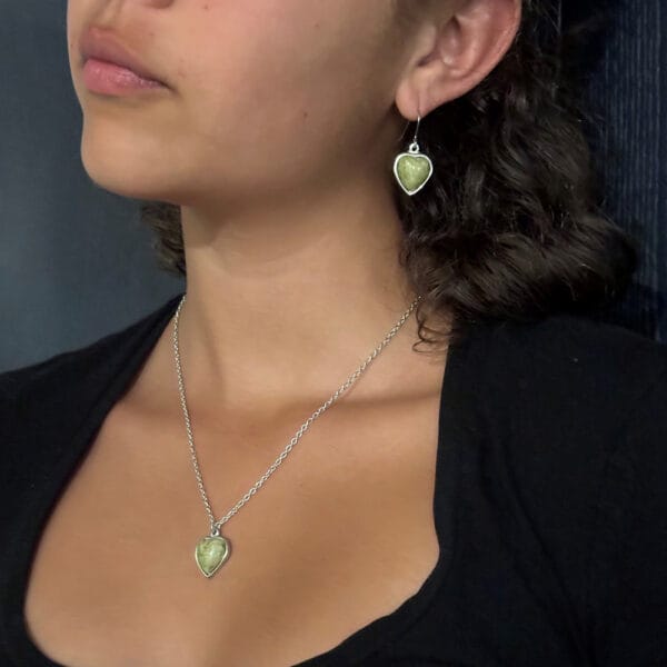 model wearing pewter iona heart pendant and earrings