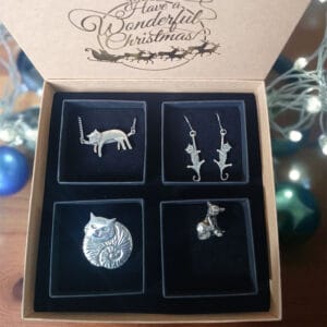Christmas cats gift box containing four pewter cat items